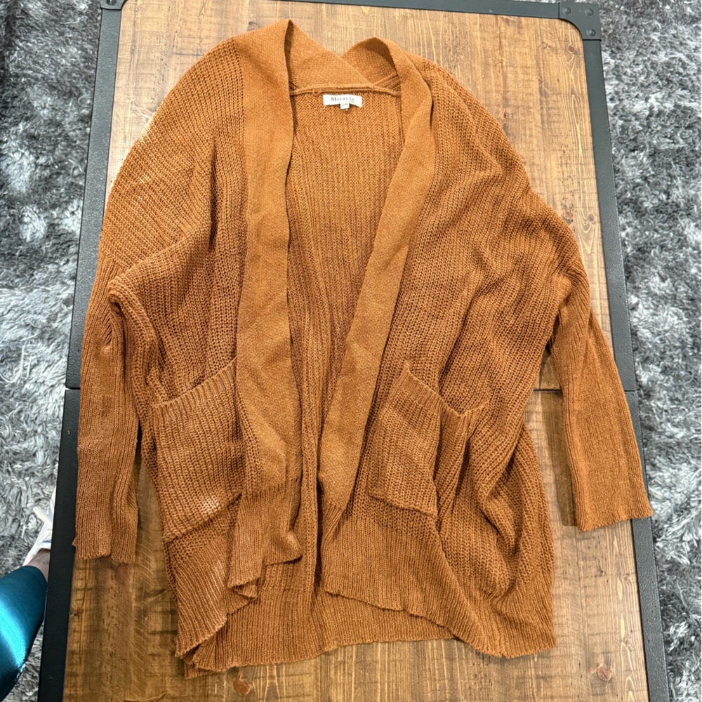 Copper sweater with neck detail and pockets